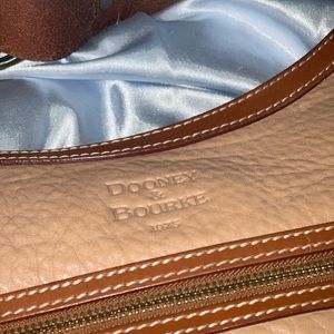 Dooney and Bourke brown under the shoulder buckle bag